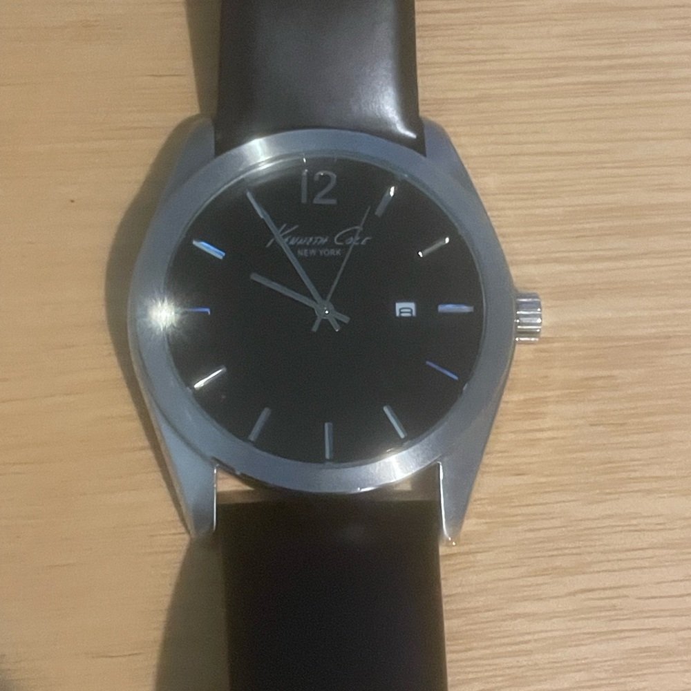 Kenneth Cole Stainless Steel Watch with Black Strap. Needs battery. Great shape